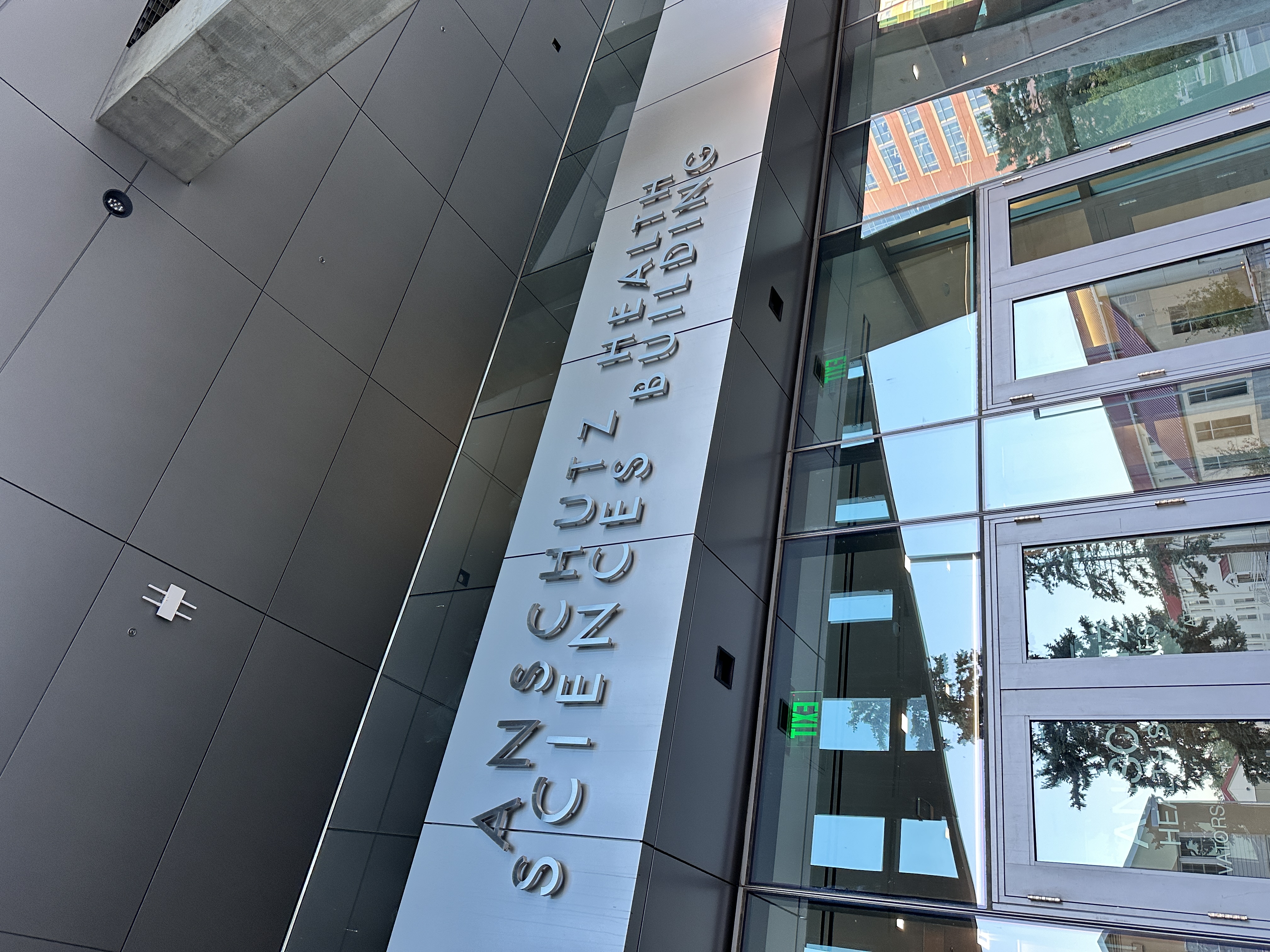 image of a sign on the University of Colorado Anschutz Health Sciences Building above the entryway