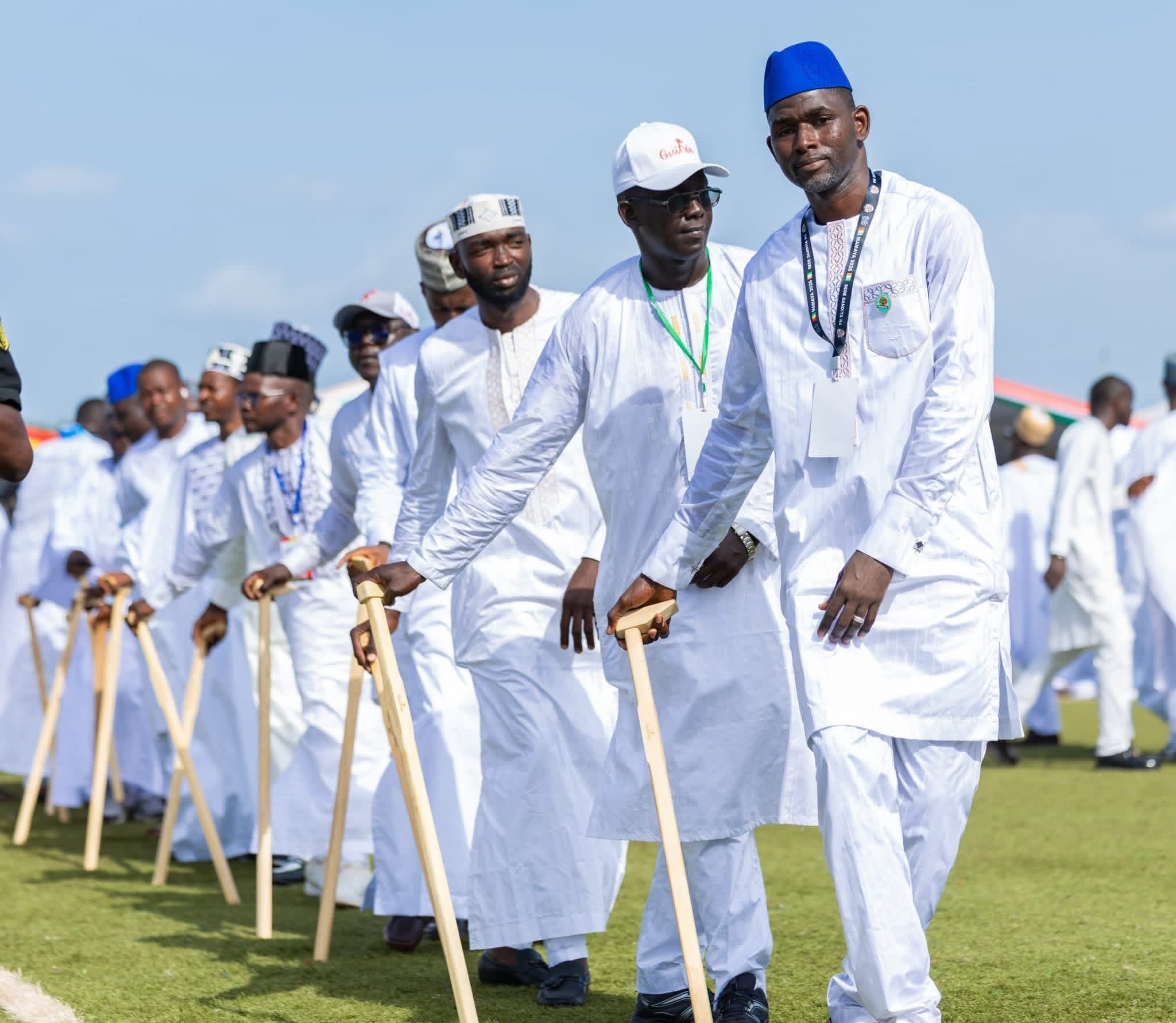 Men with ceremonial sticks