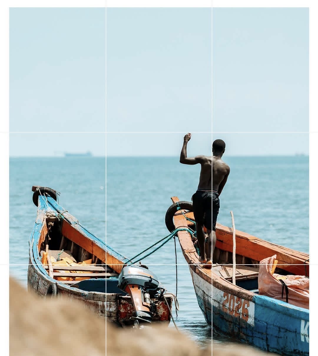 Fisherman on boat in Conakry