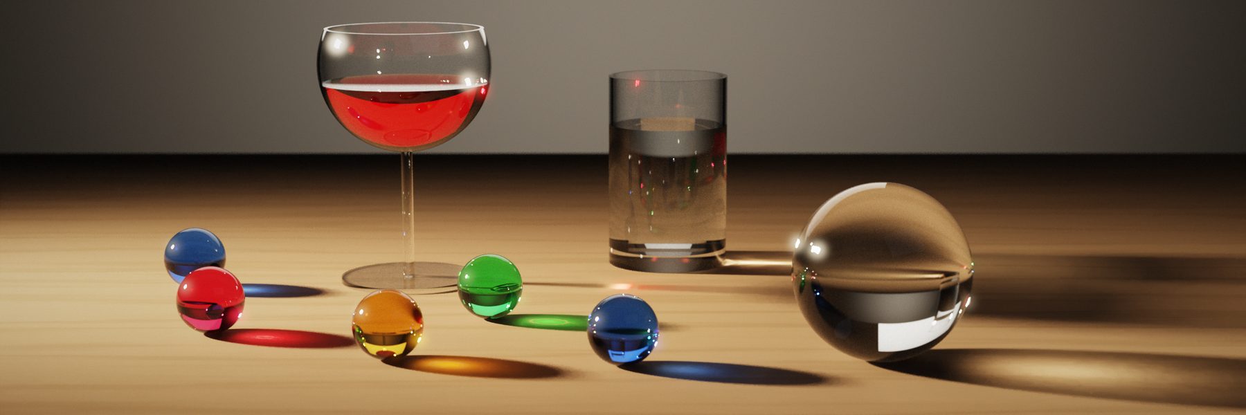 Wine glass and coloured marbles casting coloured caustics