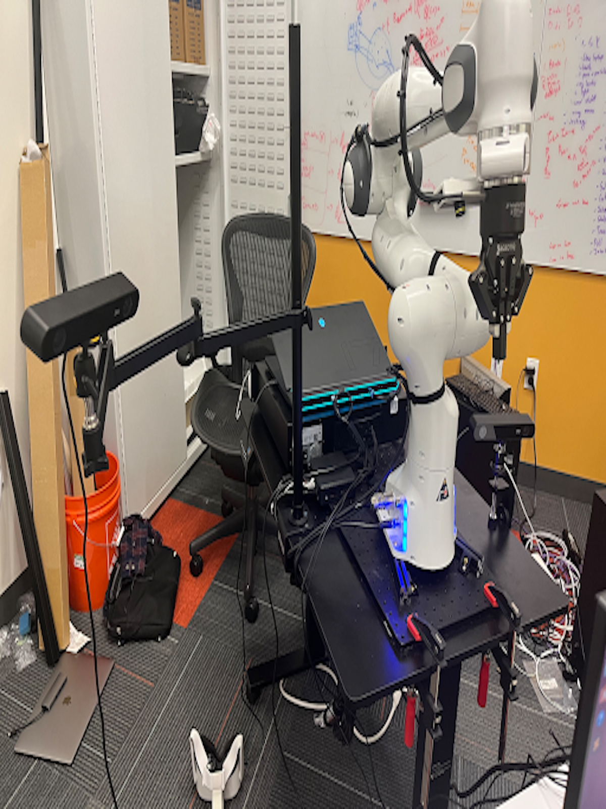 DROID Franka Panda robot and camera rig in a lab workspace
