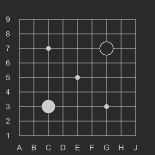 First two moves on 9x9 goban (dark theme)