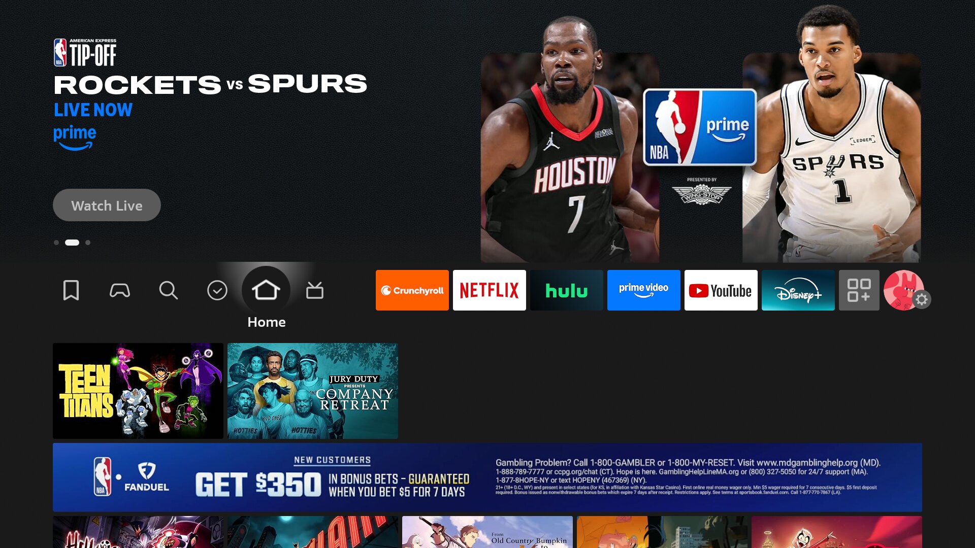 Stock Fire TV home screen with a sports betting ad and autoplaying trailers