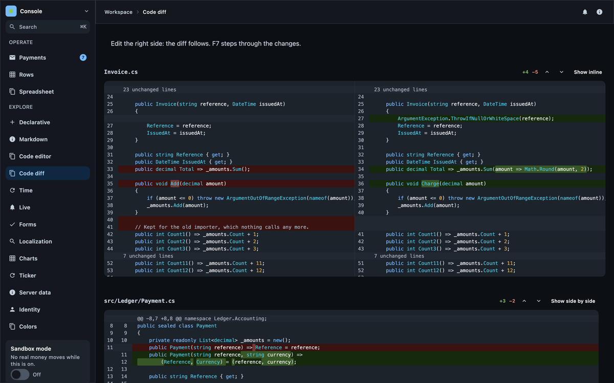 A side-by-side diff of two versions of a C# file