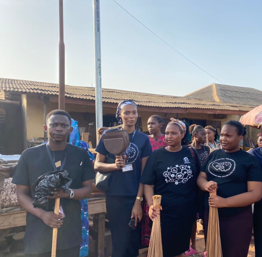 Volunteers leading a cleanup at Ketu market