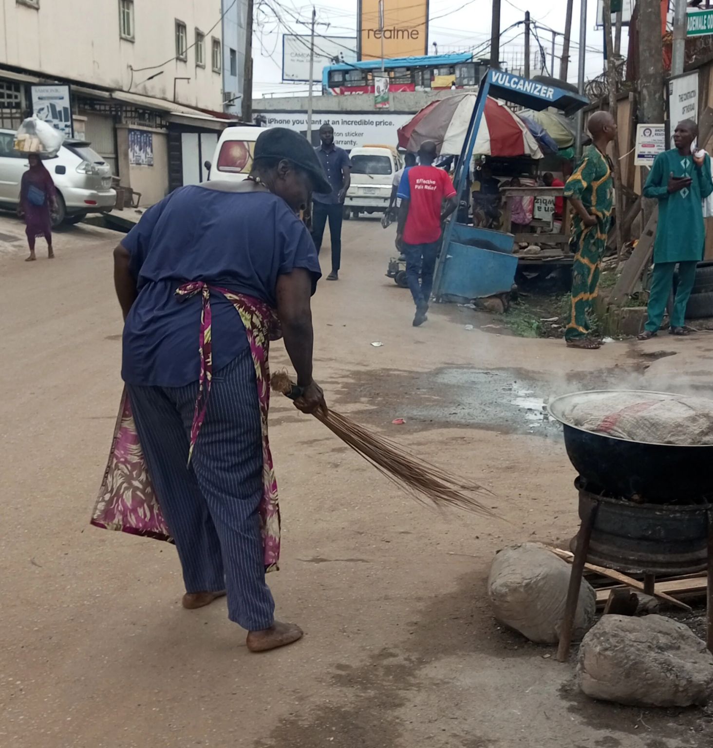 Traders cleaning up waste at Ikeja market