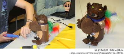 Abb. 1: Teilnehmer/innen basteln und programmieren den „Eichbär