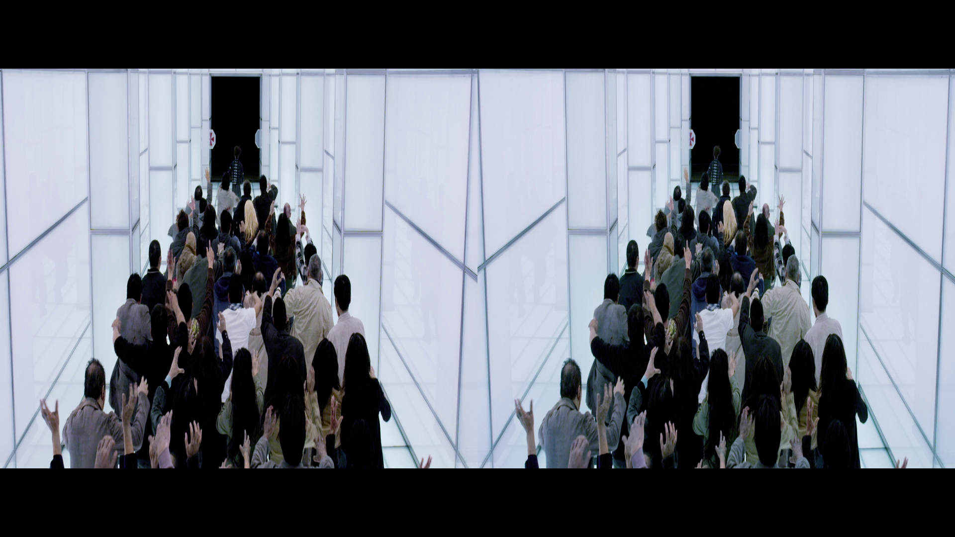 Screenshot from the movie Resident Evil: Retribution. People are crammed in a corridor.