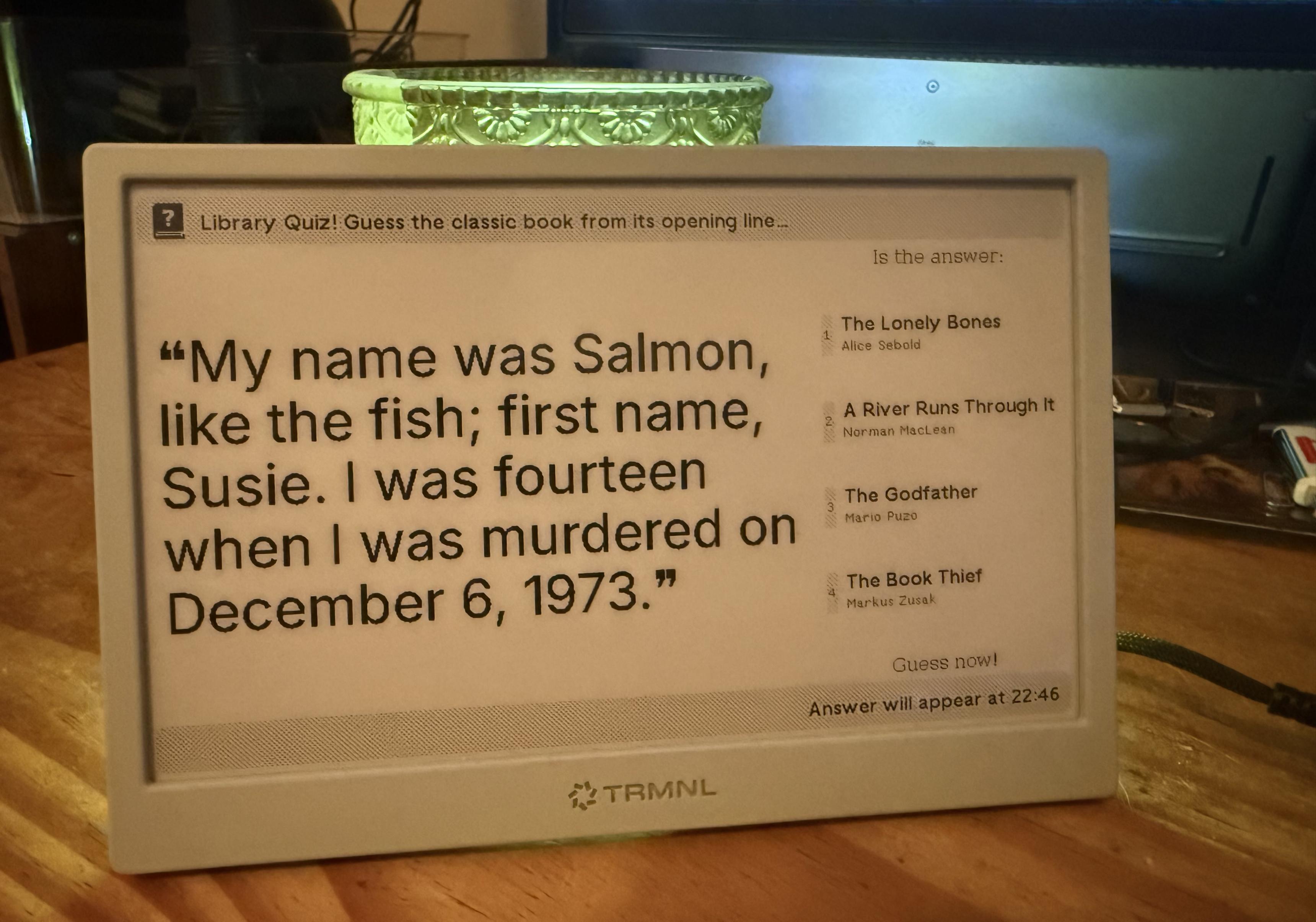 An e-ink display showing…which book it was from.