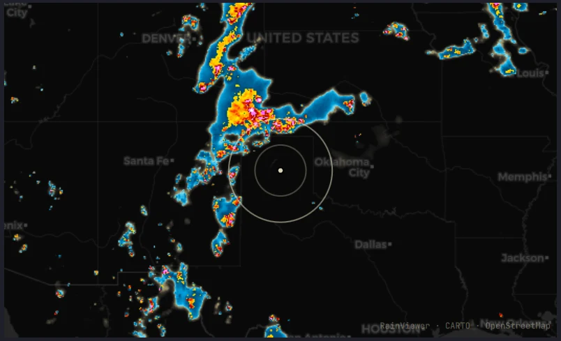 Radar over Oklahoma and Texas: blue for light rain grading through yellow and orange to red and magenta cores, over a dark base map