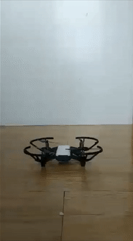 A Tello drone taking off