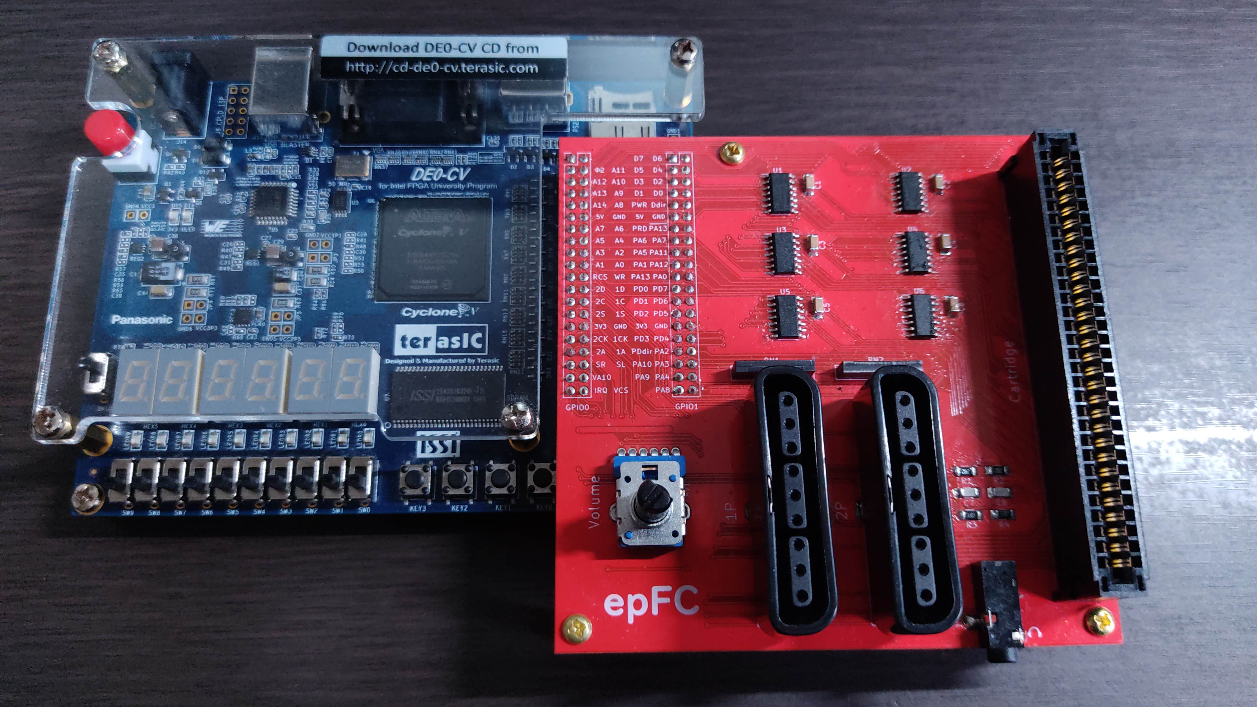 Terasic DE0-CV and my own board for connecting the FPGA and Famicom cartridges