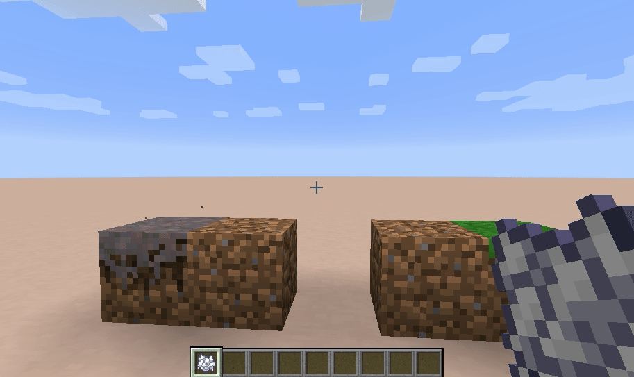 Player using bonemeal on dirt to spread grass