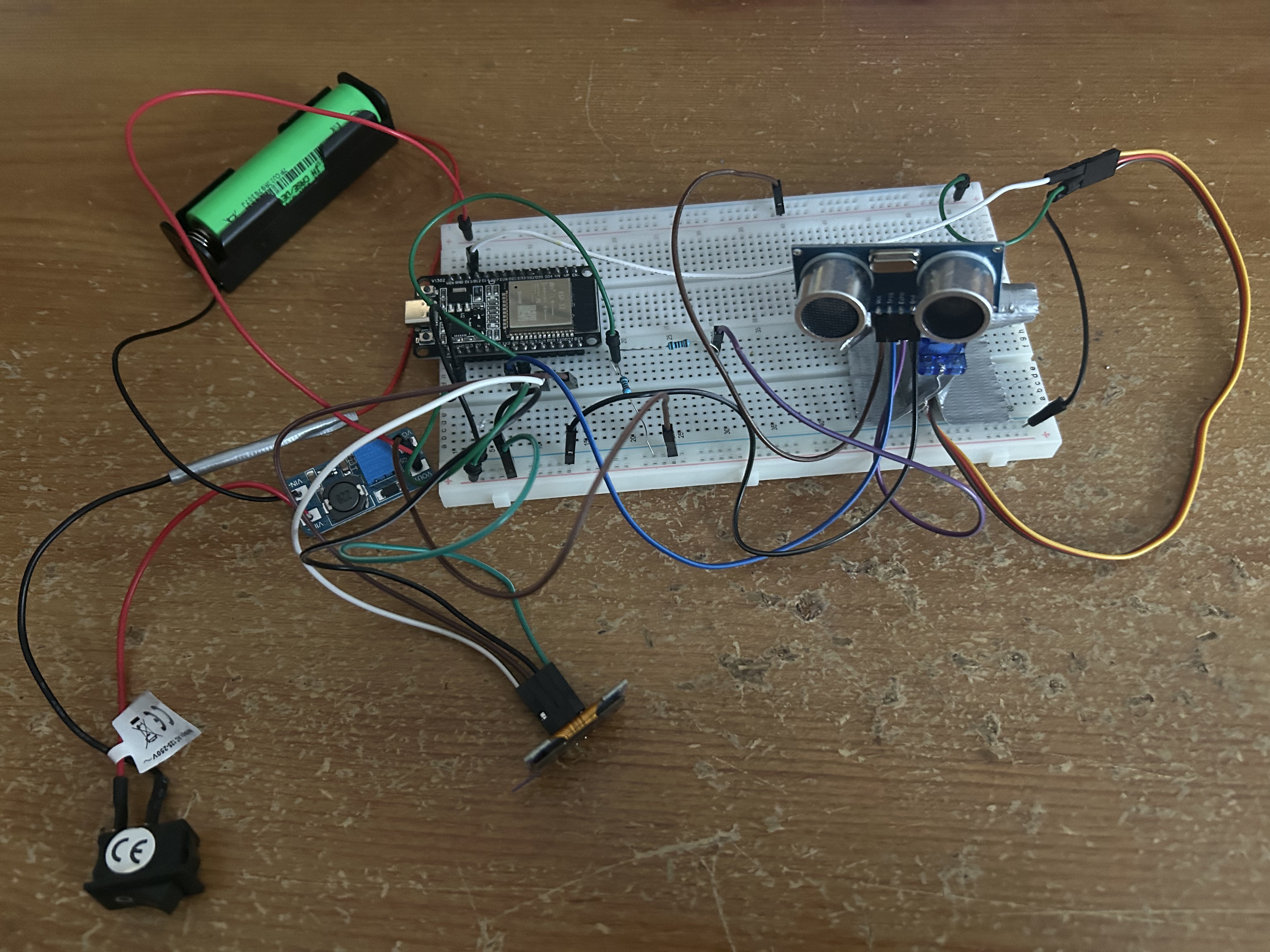 Close-up photograph of real ESP32 radar breadboard components and wiring
