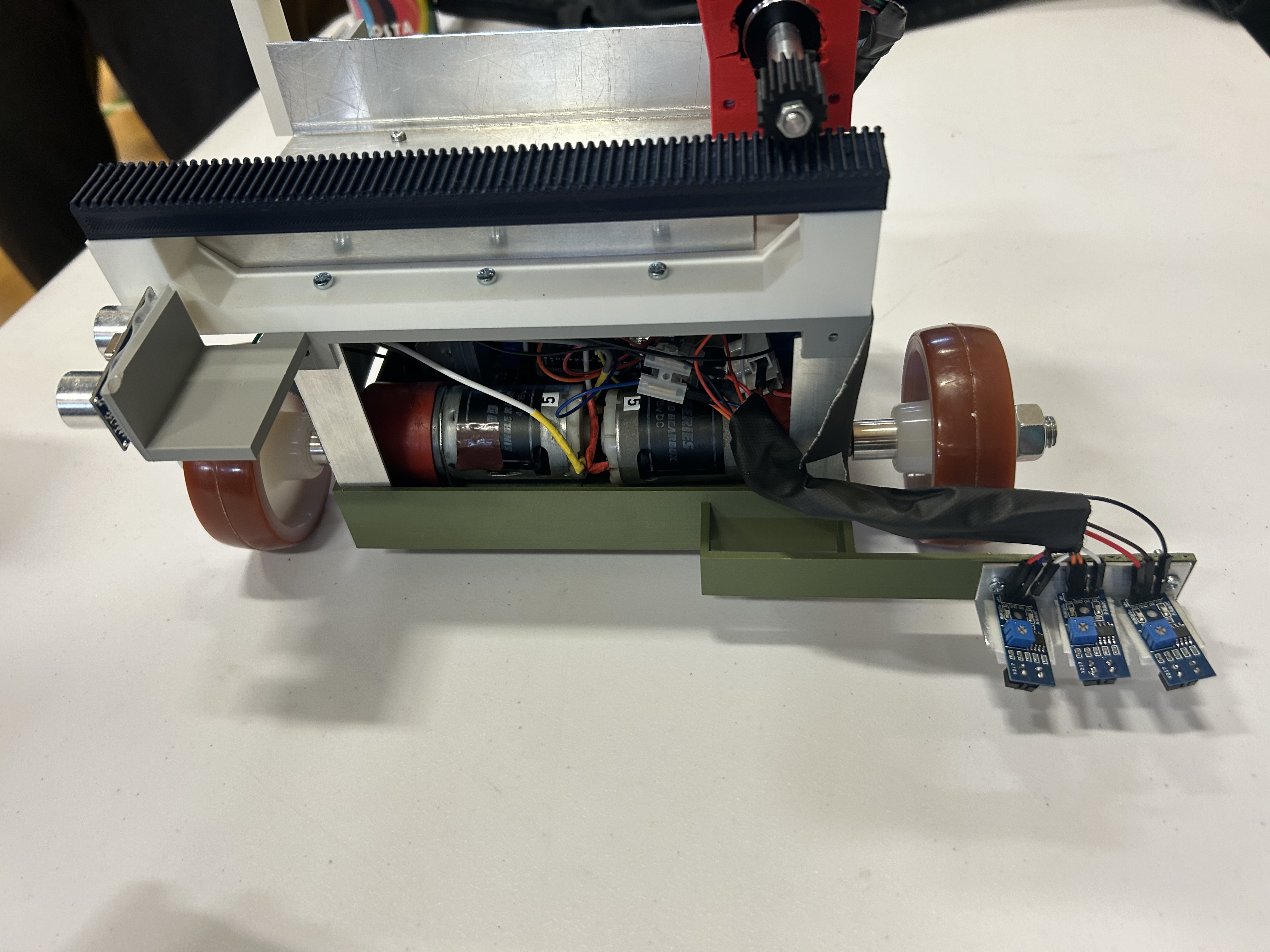 Robot prototype showing wiring, controller and motor driver modules during integration