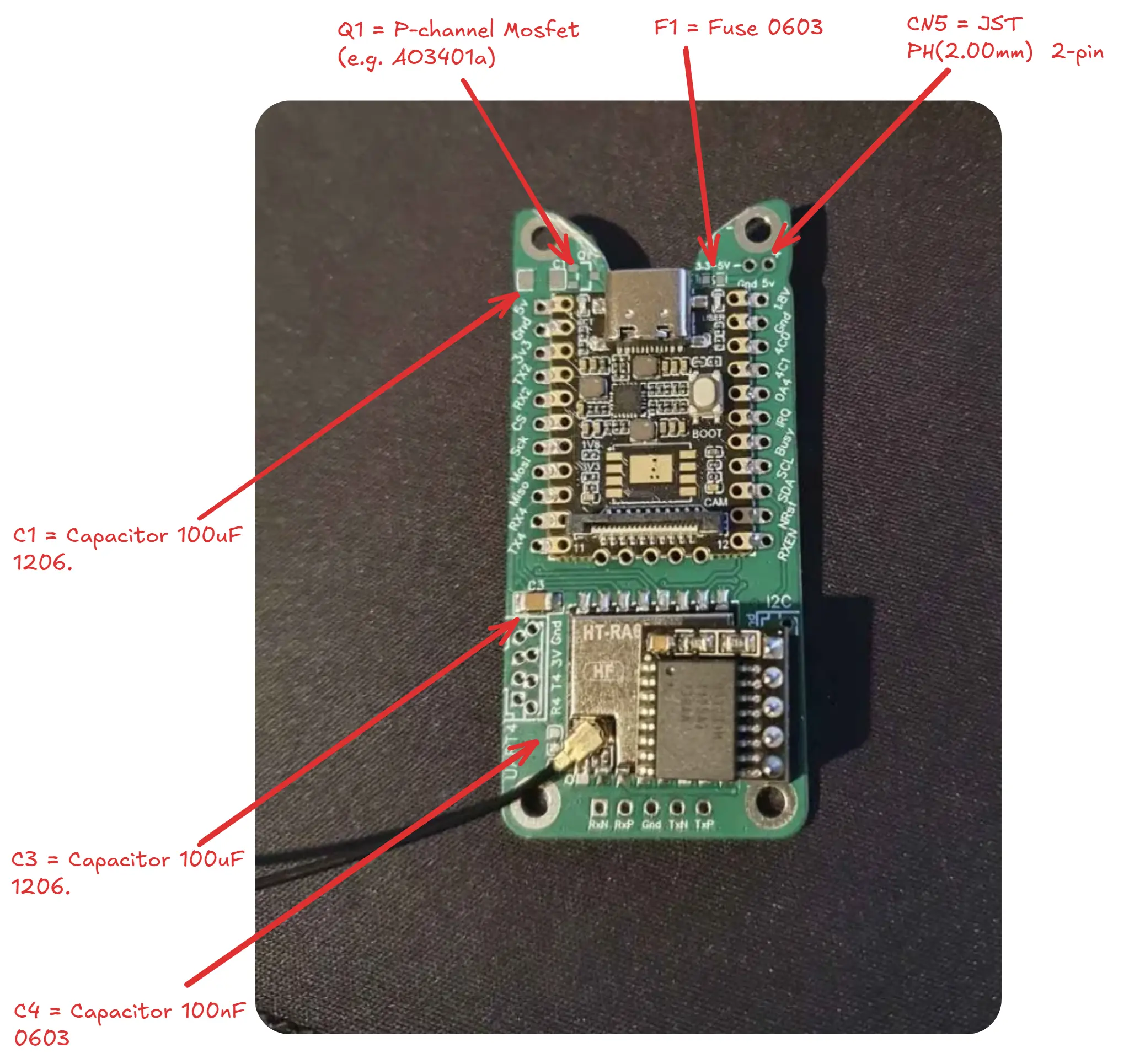 PCB with components highlighted with red arrows