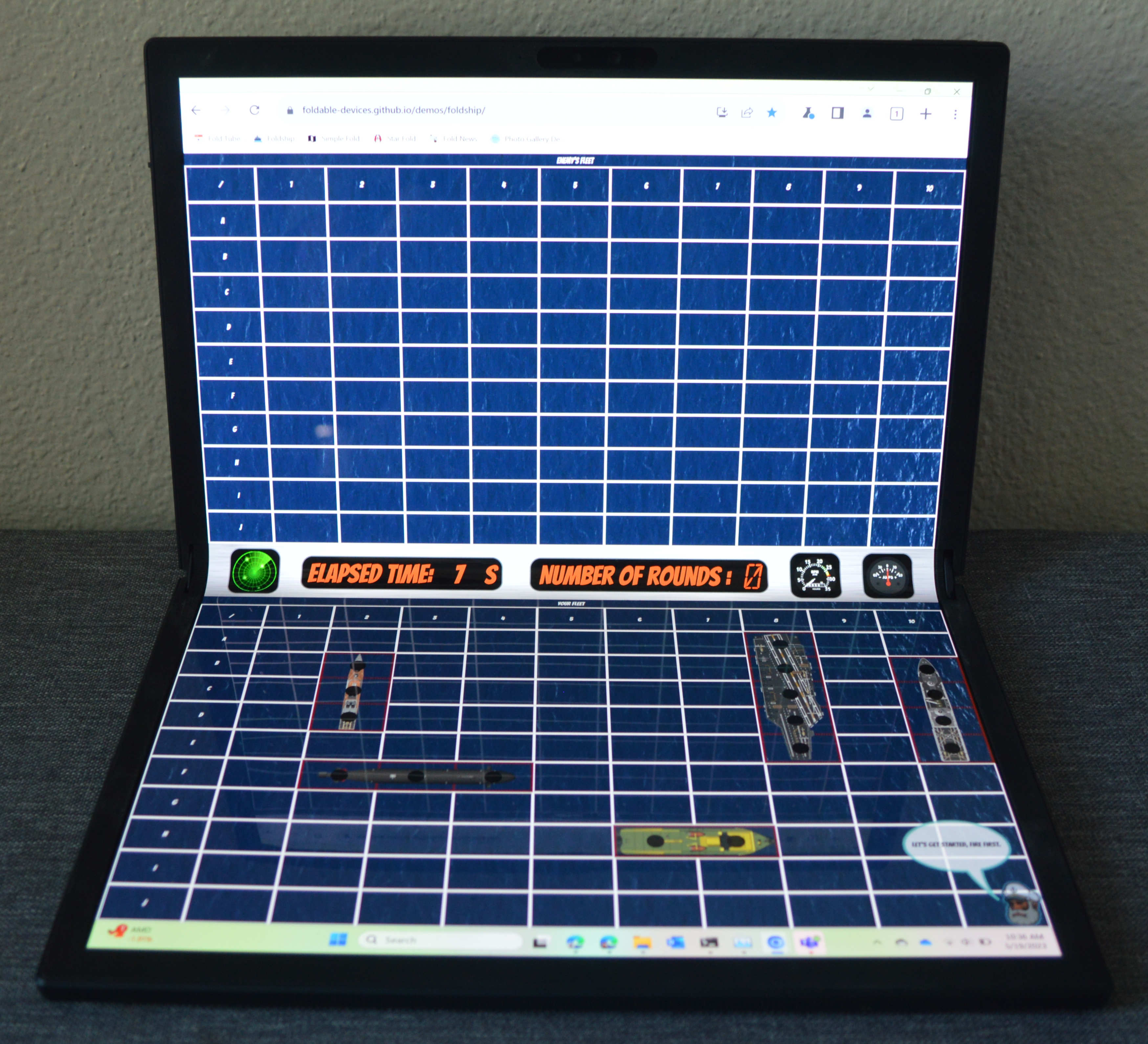 picture of a Asus Zenbook Fold running the Battleship demo game