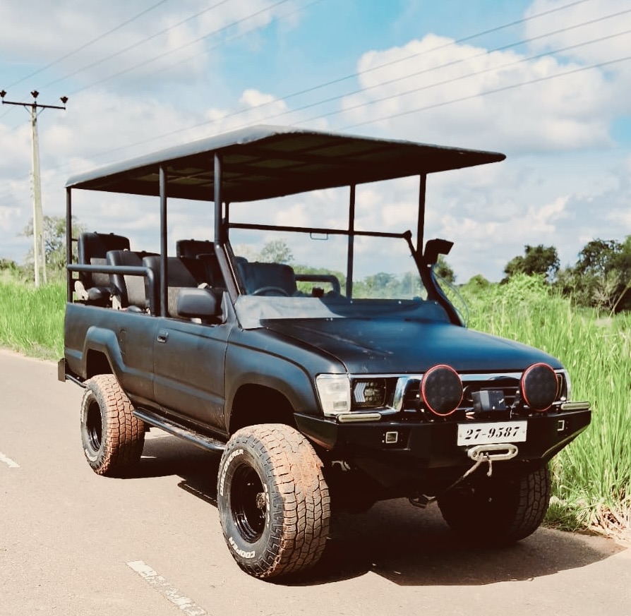 Tharaka's custom matte-black Toyota Hilux safari jeep
