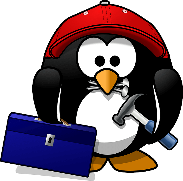 Linux mascot penguin known as Tux with some handwork tools