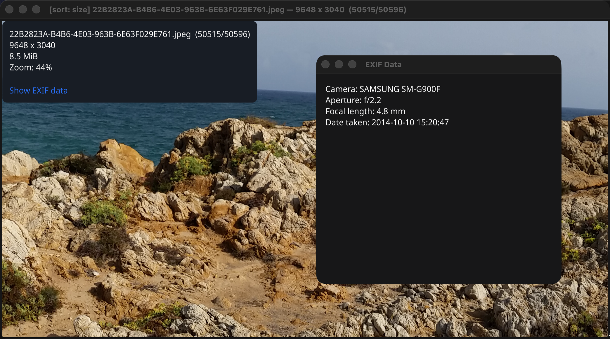 A zoomed-in photo with the file info overlay and the EXIF data window open, showing camera, aperture, focal length and capture date