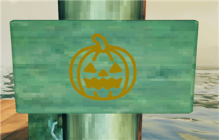 A yellow pumpkin symbol on a sign