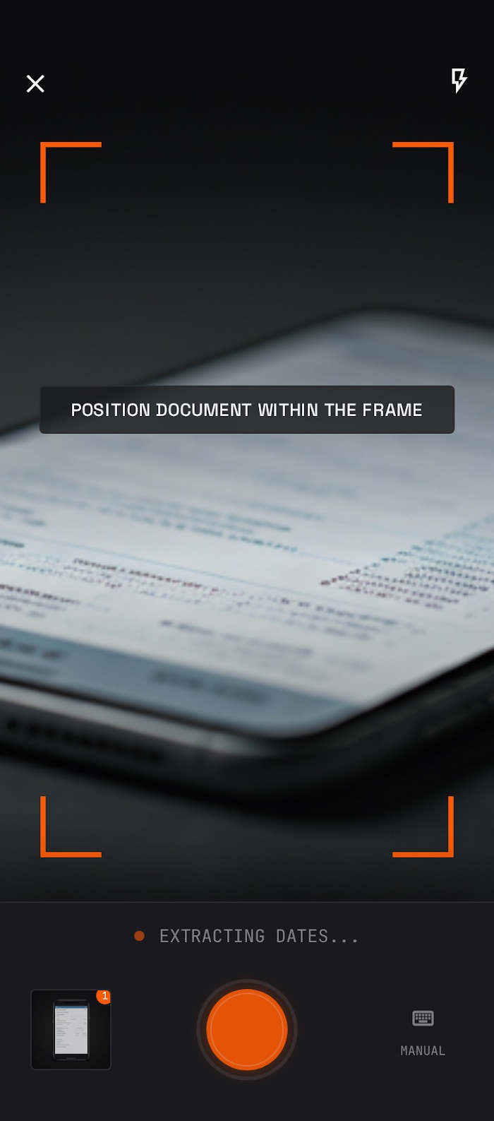 Document scanner mobile screen — dark capture UI with orange framing over a live camera view