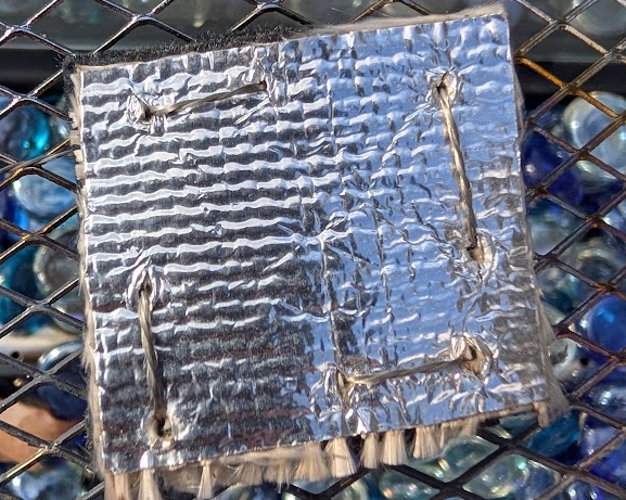 Close-up of custom aerogel heat shield material on Phoenix Inferno drone