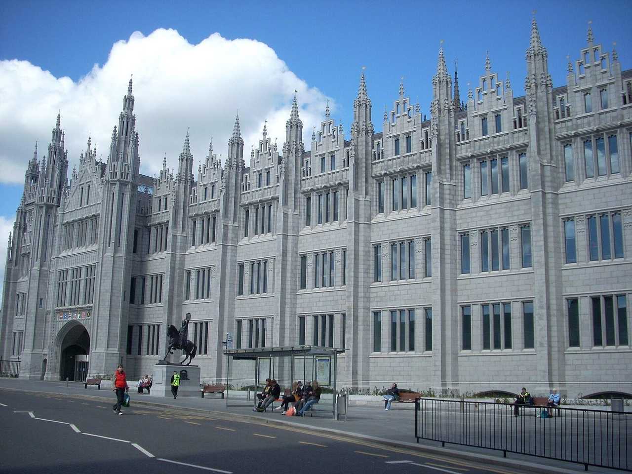 Marischal College granite Gothic facade, Aberdeen, day, blue sky with cumulus