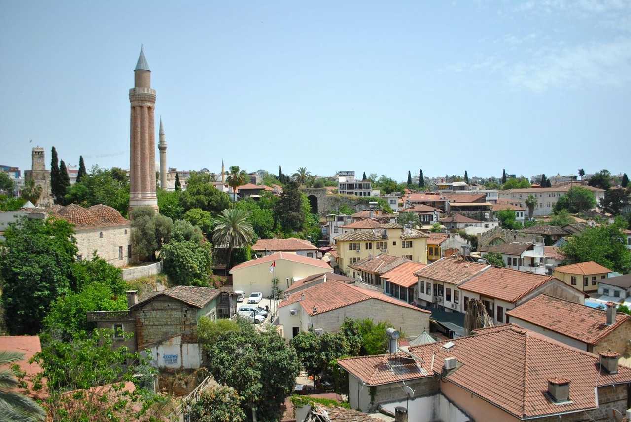 Kaleiçi old town with Yivli Minaret, Antalya, day, pale blue sky