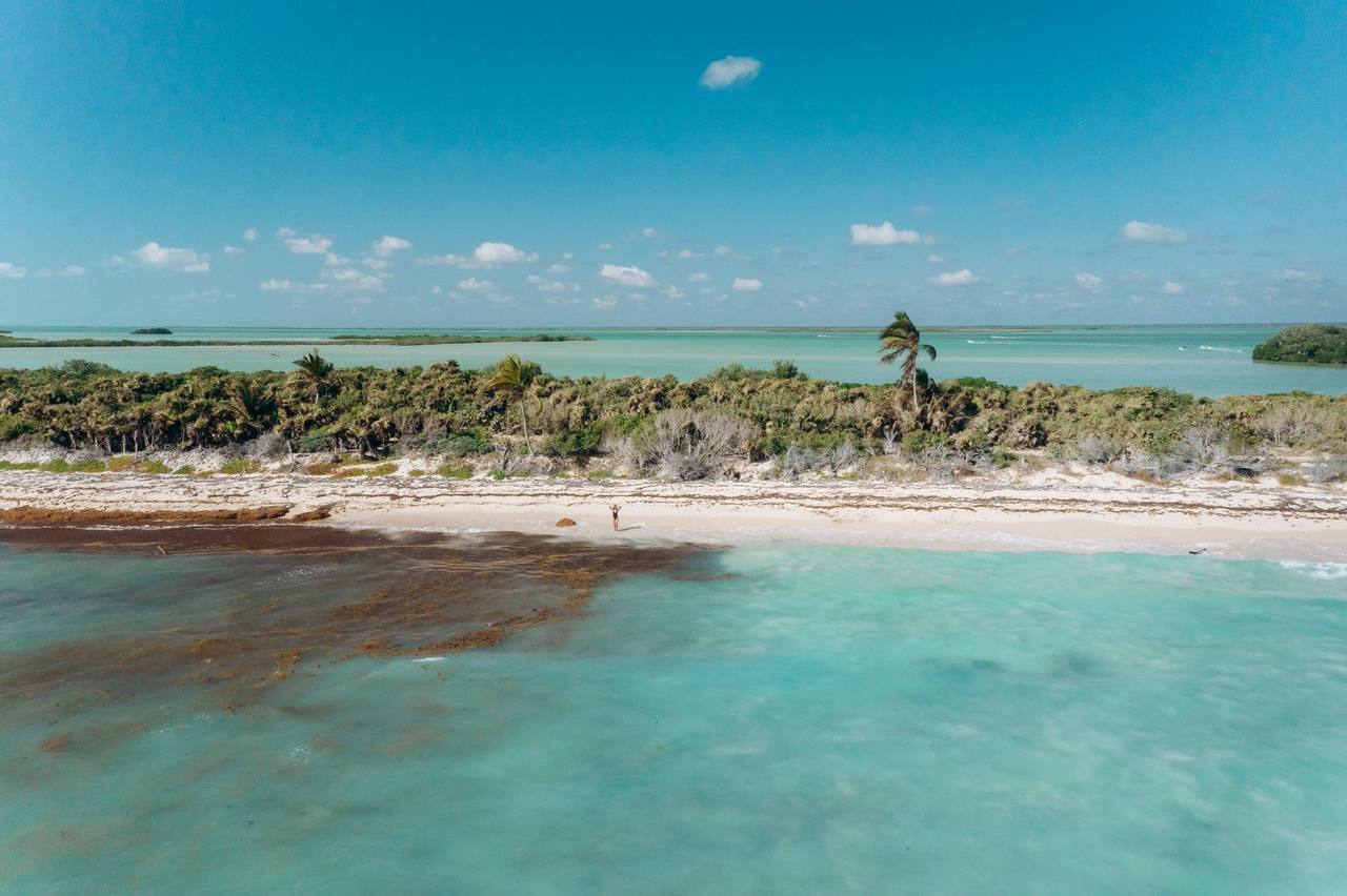 Caribbean Mexico white-sand beach and turquoise lagoon (Costa Maya / Mahahual character), day, blue sky