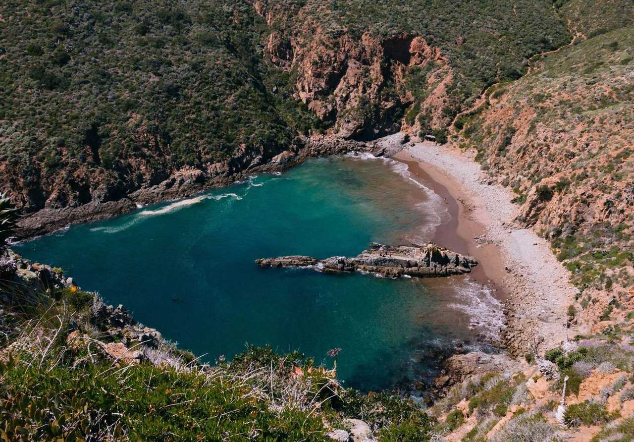 Ensenada Baja California rocky cove and turquoise water, day, bright sun
