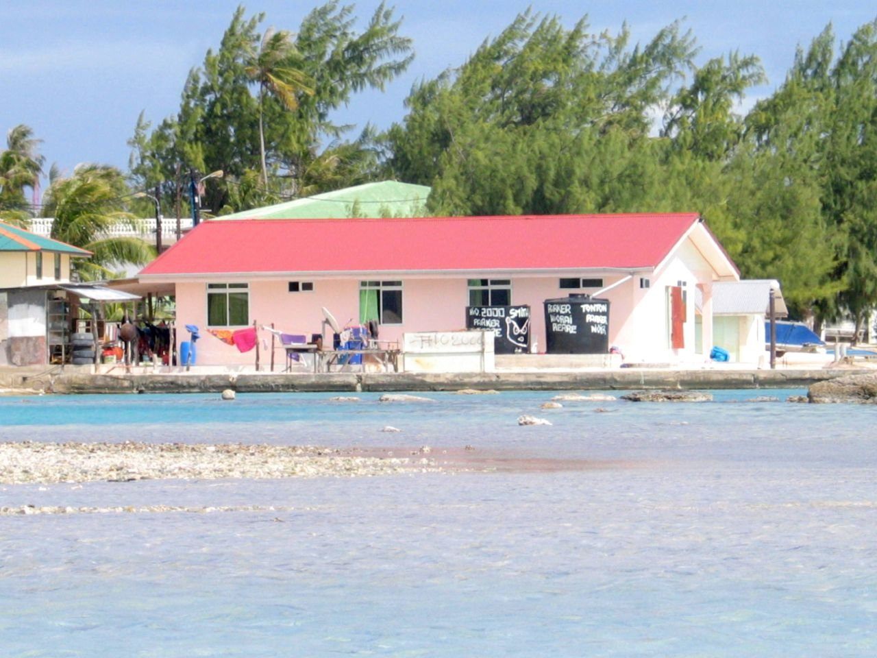 Turquoise lagoon and coral motu shoreline at Fakarava atoll