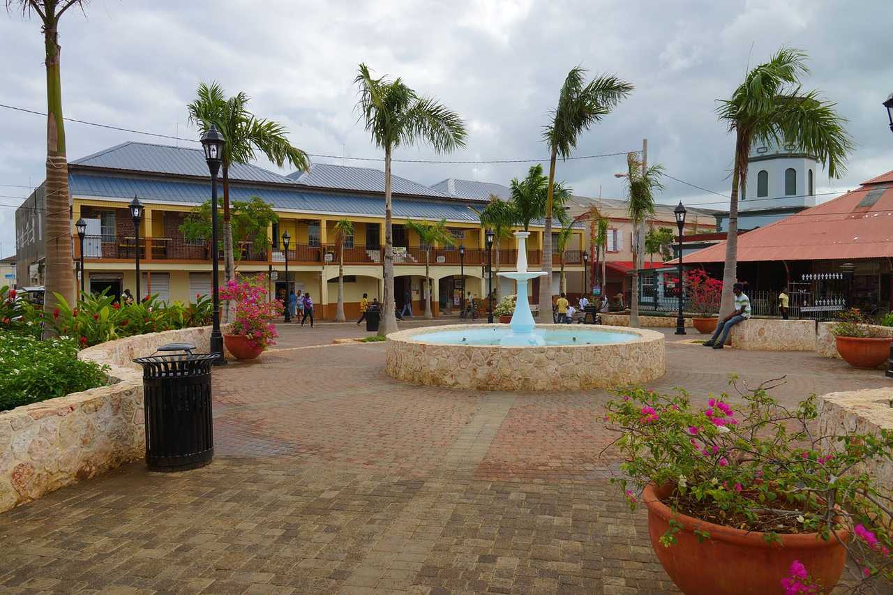Falmouth Water Square fountain and colonial facades, day, bright sky