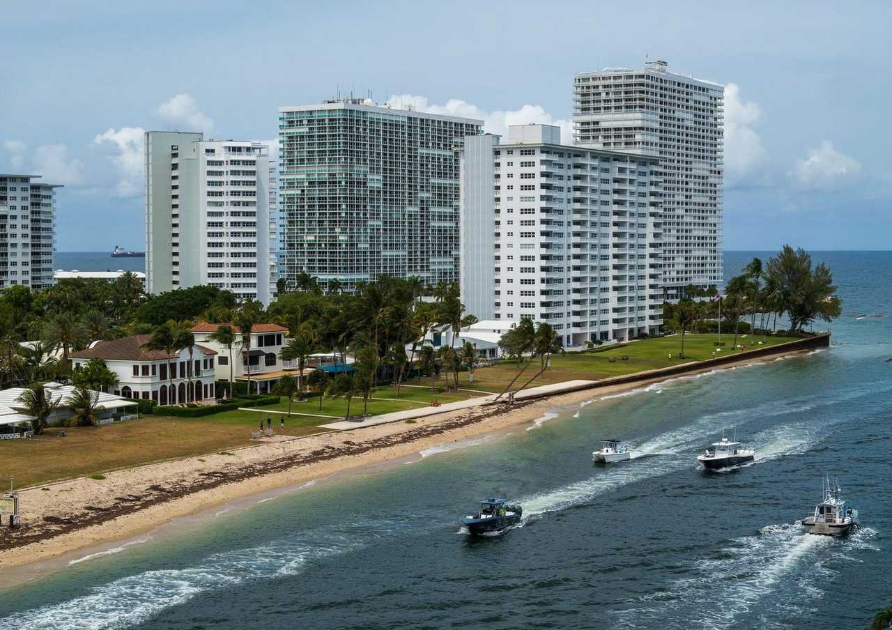 Fort Lauderdale beachfront high-rises, day, blue sky