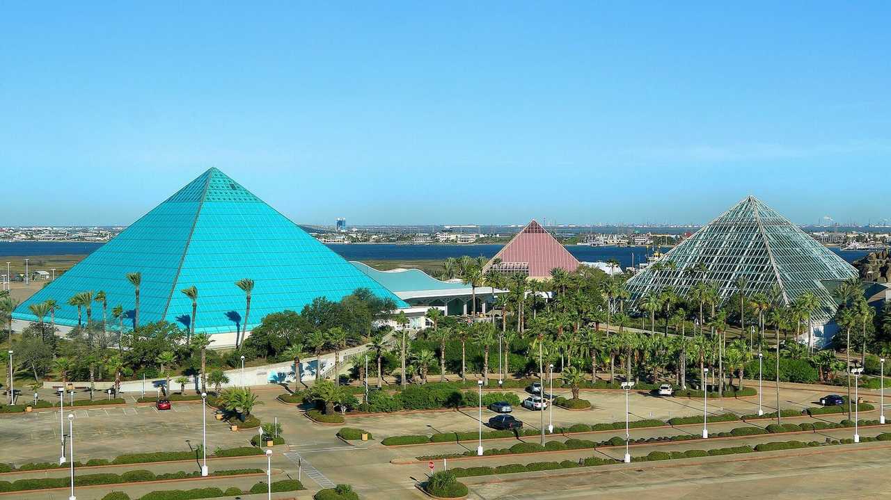 Moody Gardens glass pyramids, Galveston landmark, day, clear blue sky