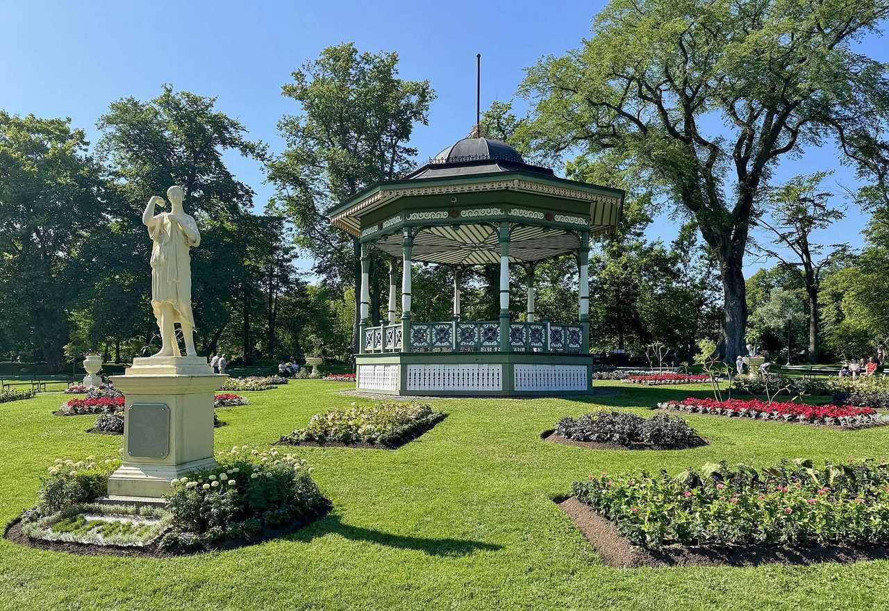 Halifax Public Gardens bandstand and lawns, day, solid blue sky