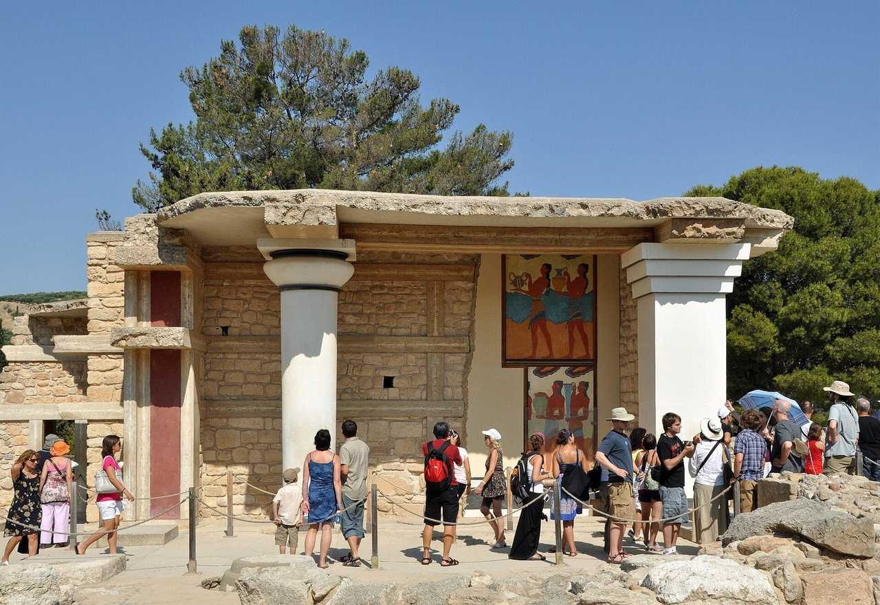 Knossos Palace reconstructed columns and Procession Fresco, Crete (Heraklion), day, solid blue sky