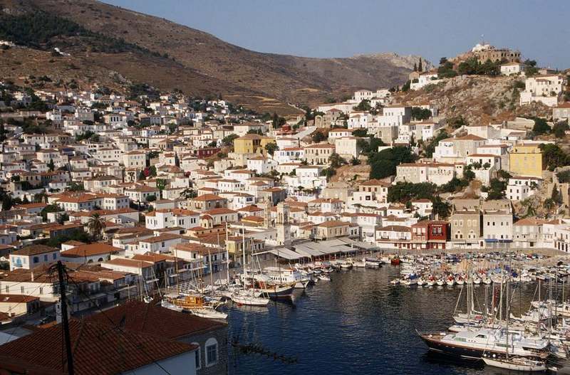 Hydra Town horseshoe harbour and stone mansions in the Saronic Islands