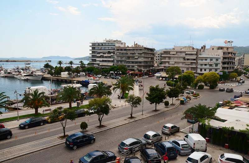 Kavala harbour, aqueduct arches, and hillside old town on the north Aegean