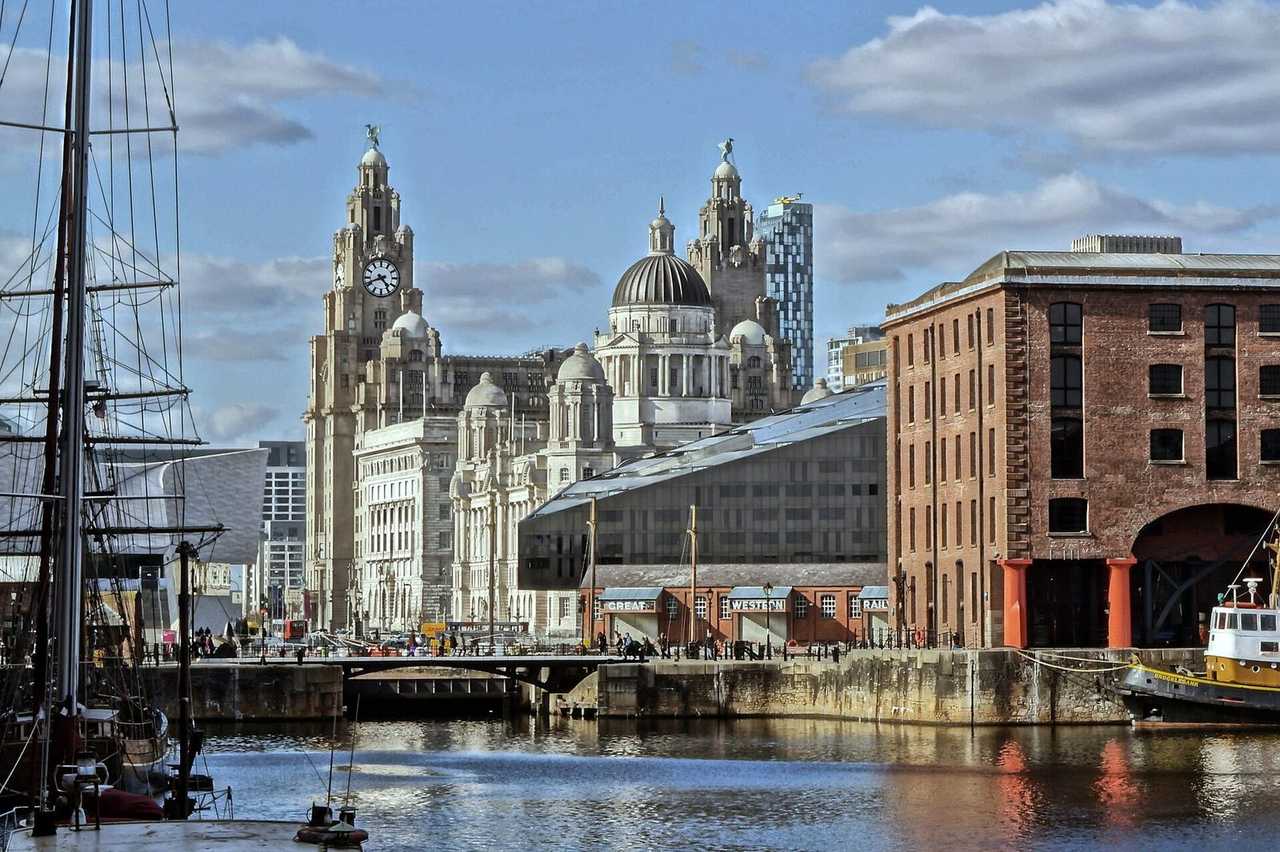 Liverpool Three Graces / Pier Head from Albert Dock, day, blue sky