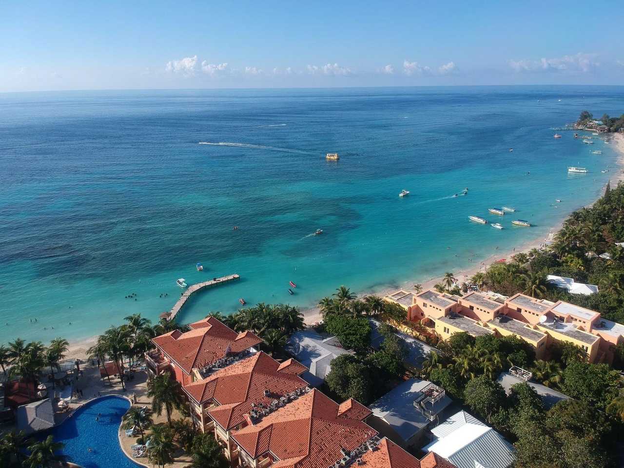 West Bay Beach aerial, Roatán, turquoise Caribbean, day, blue sky