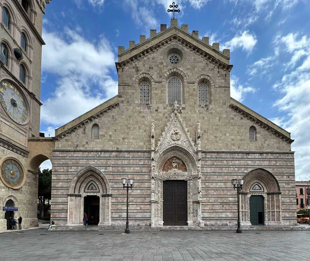 Messina Cathedral and astronomical clock tower, Piazza del Duomo, day, blue sky