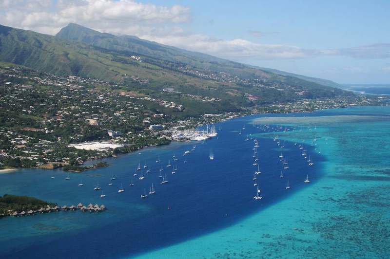 West-coast lagoon and beach on Tahiti beyond Papeete