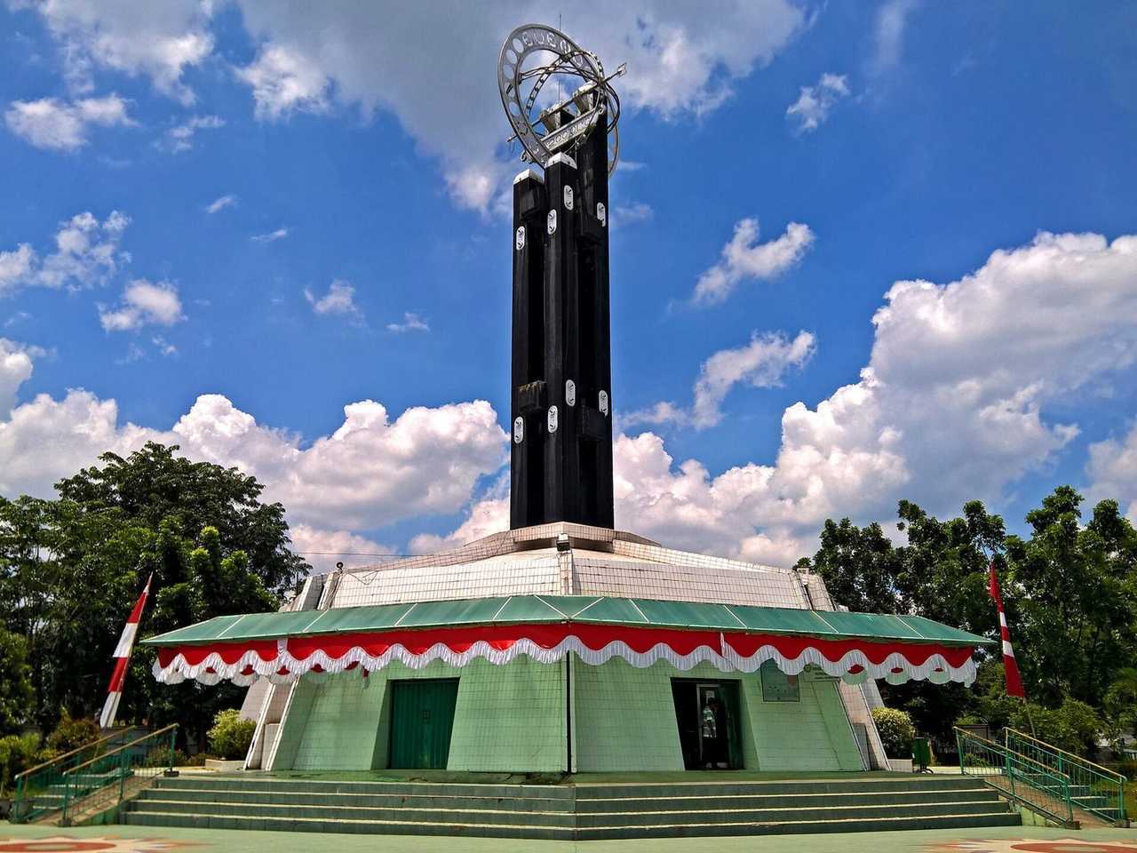 Equator Monument (Tugu Khatulistiwa) Pontianak, day, blue sky with cumulus