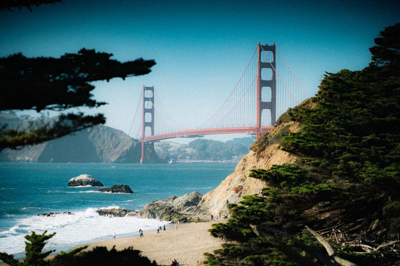 Golden Gate Bridge from Baker Beach, day, blue sky