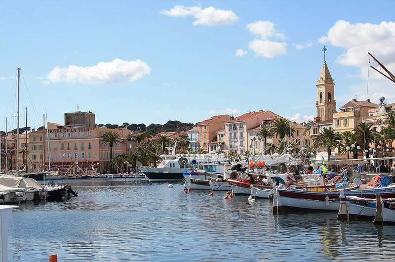 Sanary-sur-Mer pastel harbour quay and fishing boats on the Provençal coast