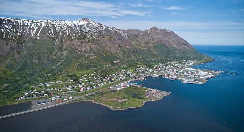 Siglufjörður harbour and mountain-walled fjord town in northern Iceland