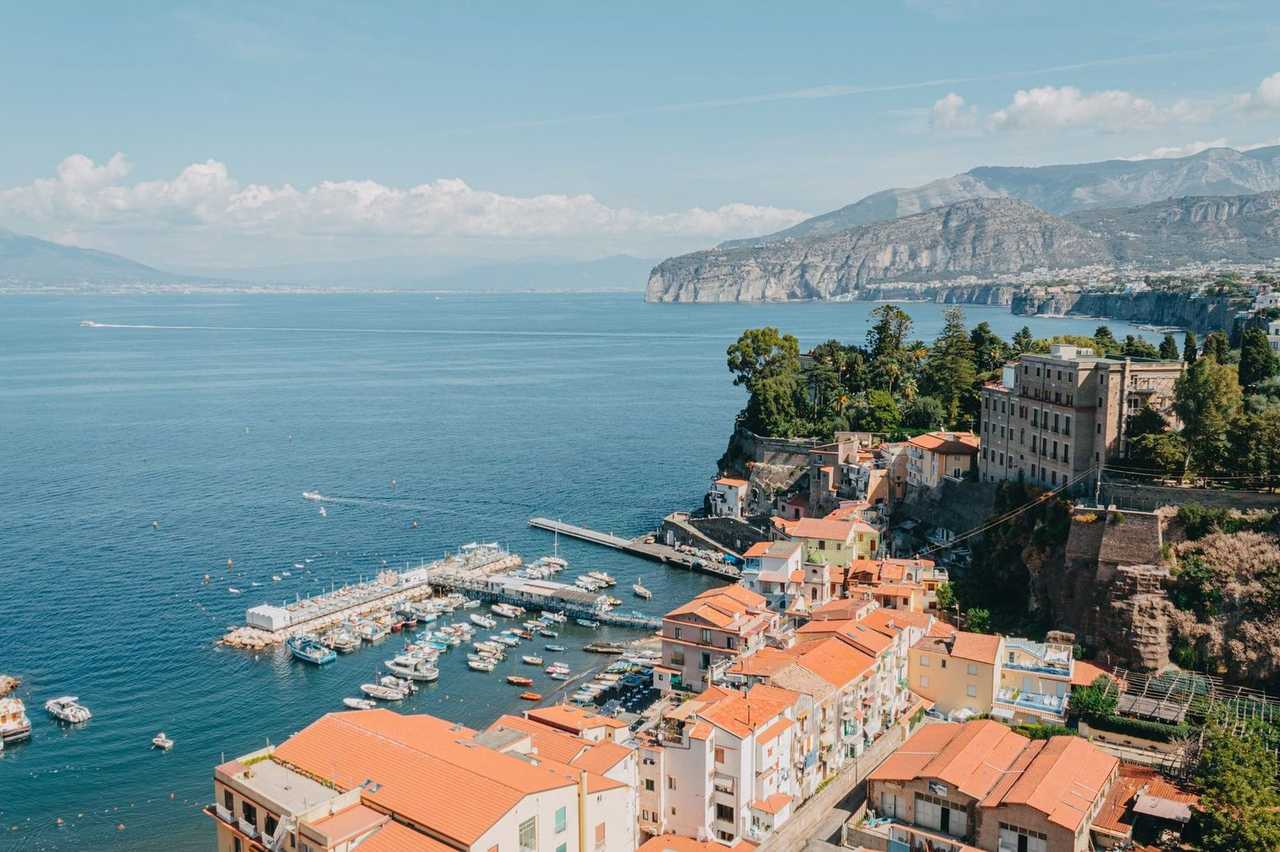 Sorrento cliff town and bay, day, blue sky