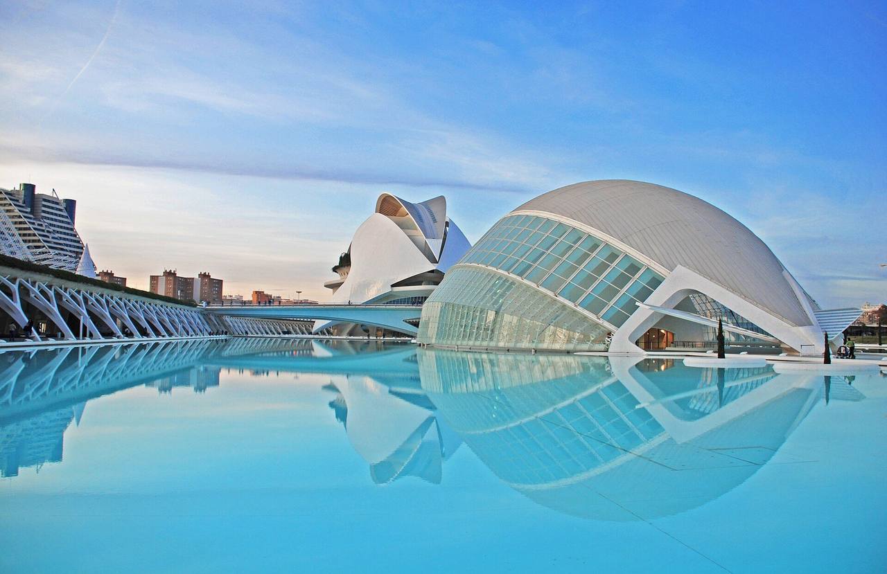 City of Arts and Sciences: L'Hemisfèric and Palau de les Arts, reflecting pool, day, blue sky