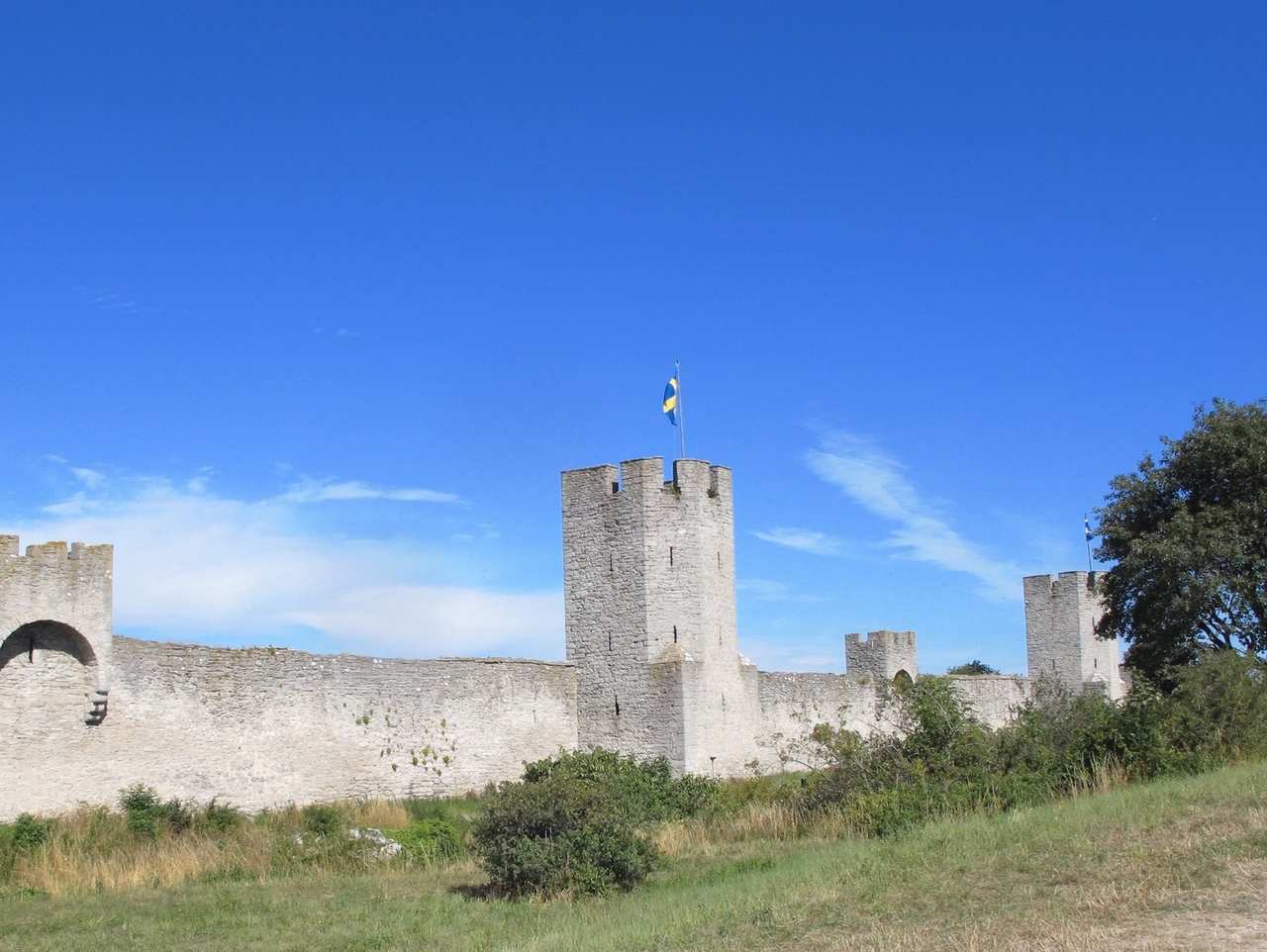 Visby ringmur / medieval city wall towers, Gotland, day, solid blue sky